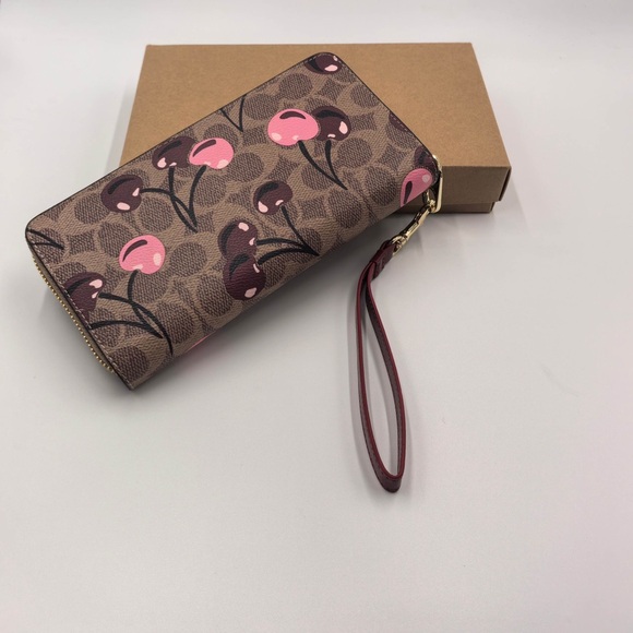 Coach Handbags - COACH Signature Cherry Print Long Wallet with Wrist Strap